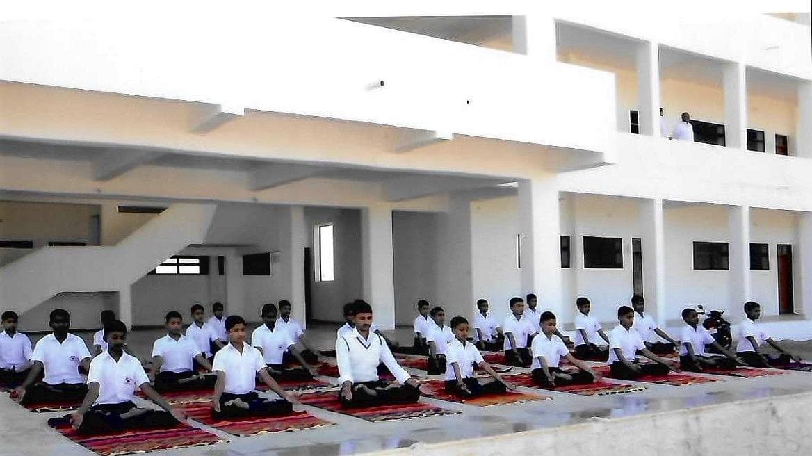 Students performing yoga at Shree Gurukul Vidyapeeth